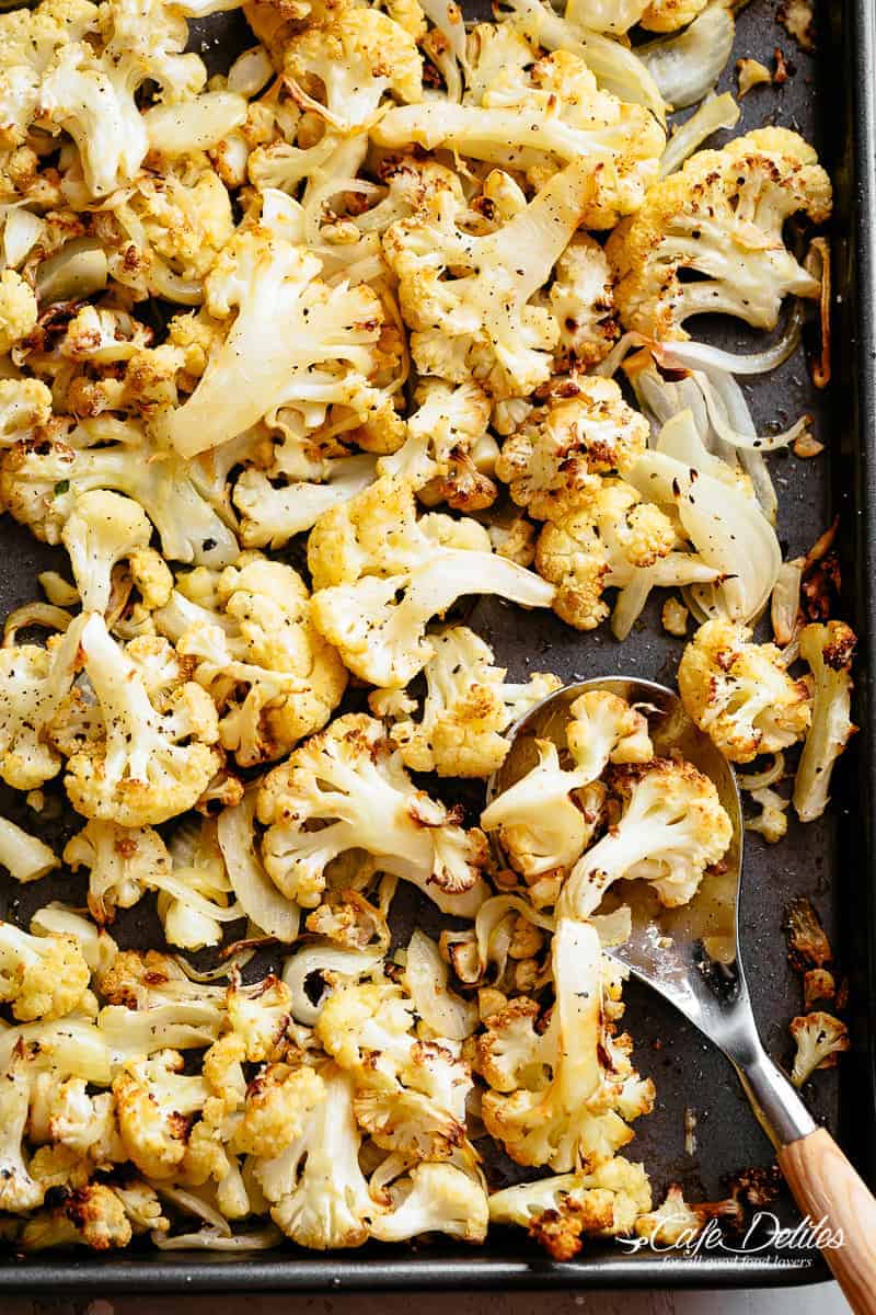 Roasted cauliflower on a baking tray. 