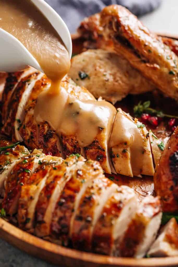 Crispy Skinned Slow Cooker Turkey is THE MOST succulent Turkey, WITHOUT brining OR marinading! This Turkey will have EVERYONE talking