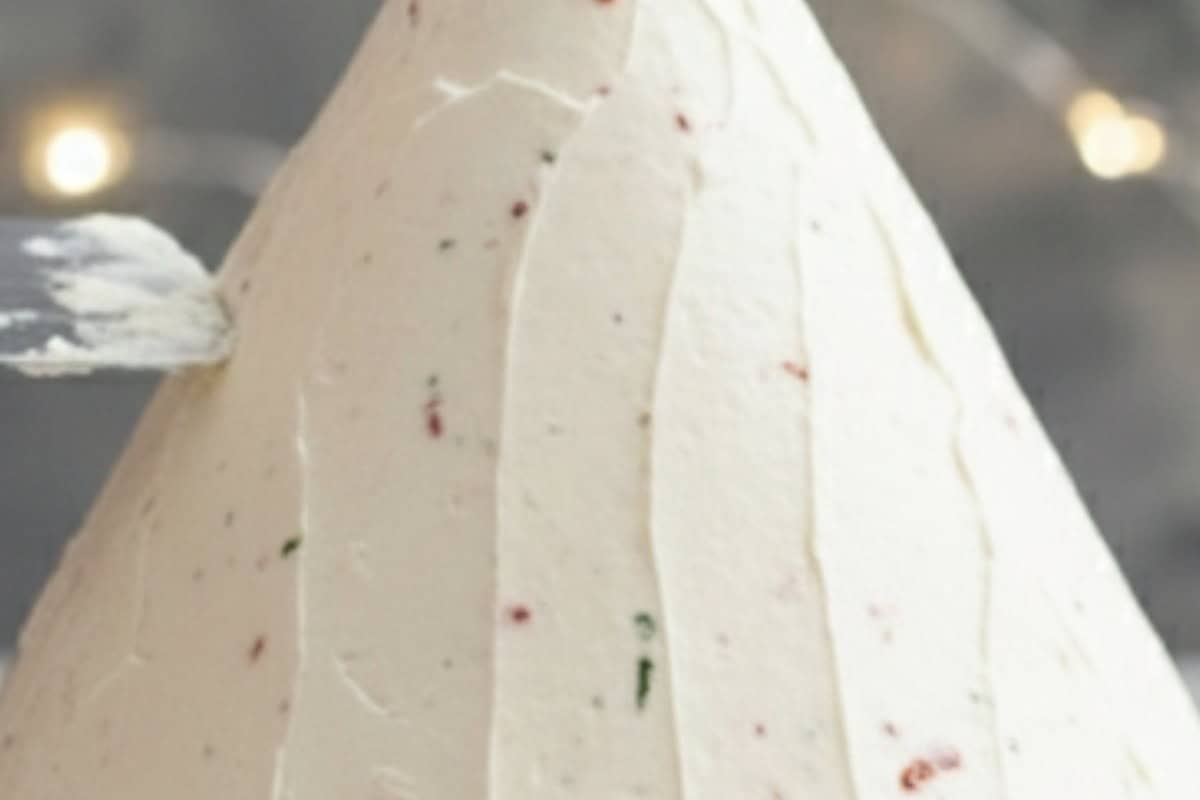 Remove the remaining wrap and use a cake spatula to smooth the sides and tip so it holds its shape.