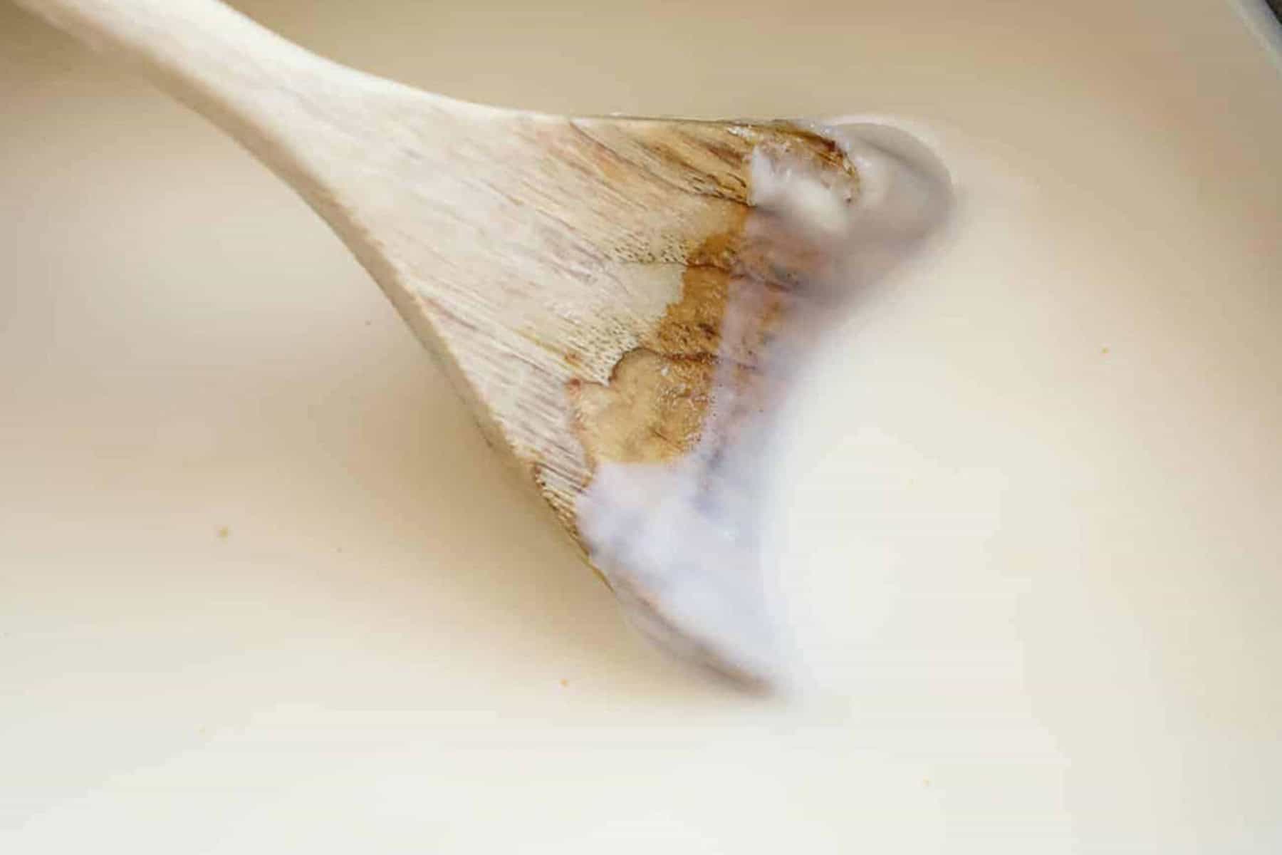 close up White sauce for lasagna in a pan