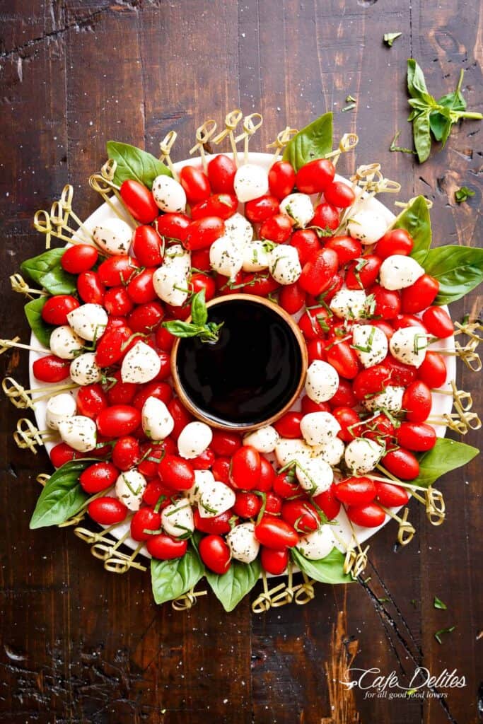 Top view image of Caprese Salad Christmas Wreath is a festive and healthy appetiser for your Christmas table! 