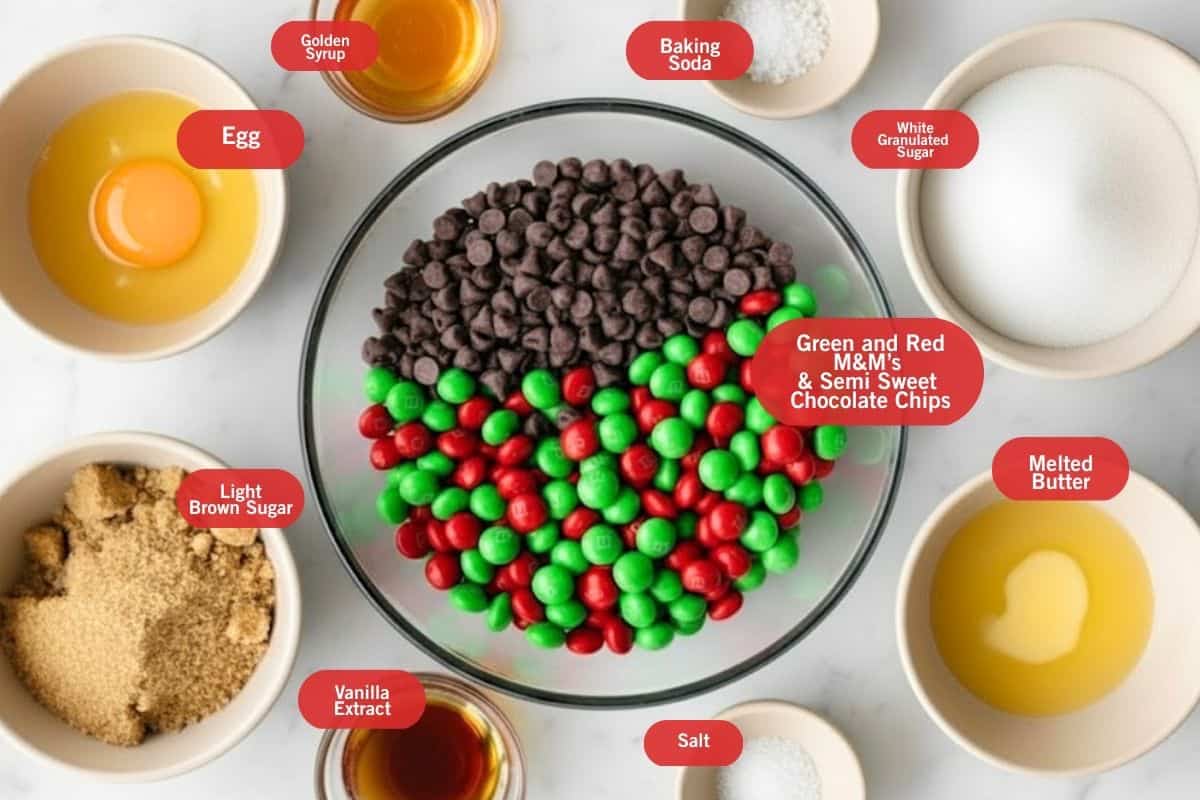 Flat lay photo of ingredient shot of egg, golden syrup, baking soda, white granulated sugar, melted butter, light brown sugar, vanilla extract, salt