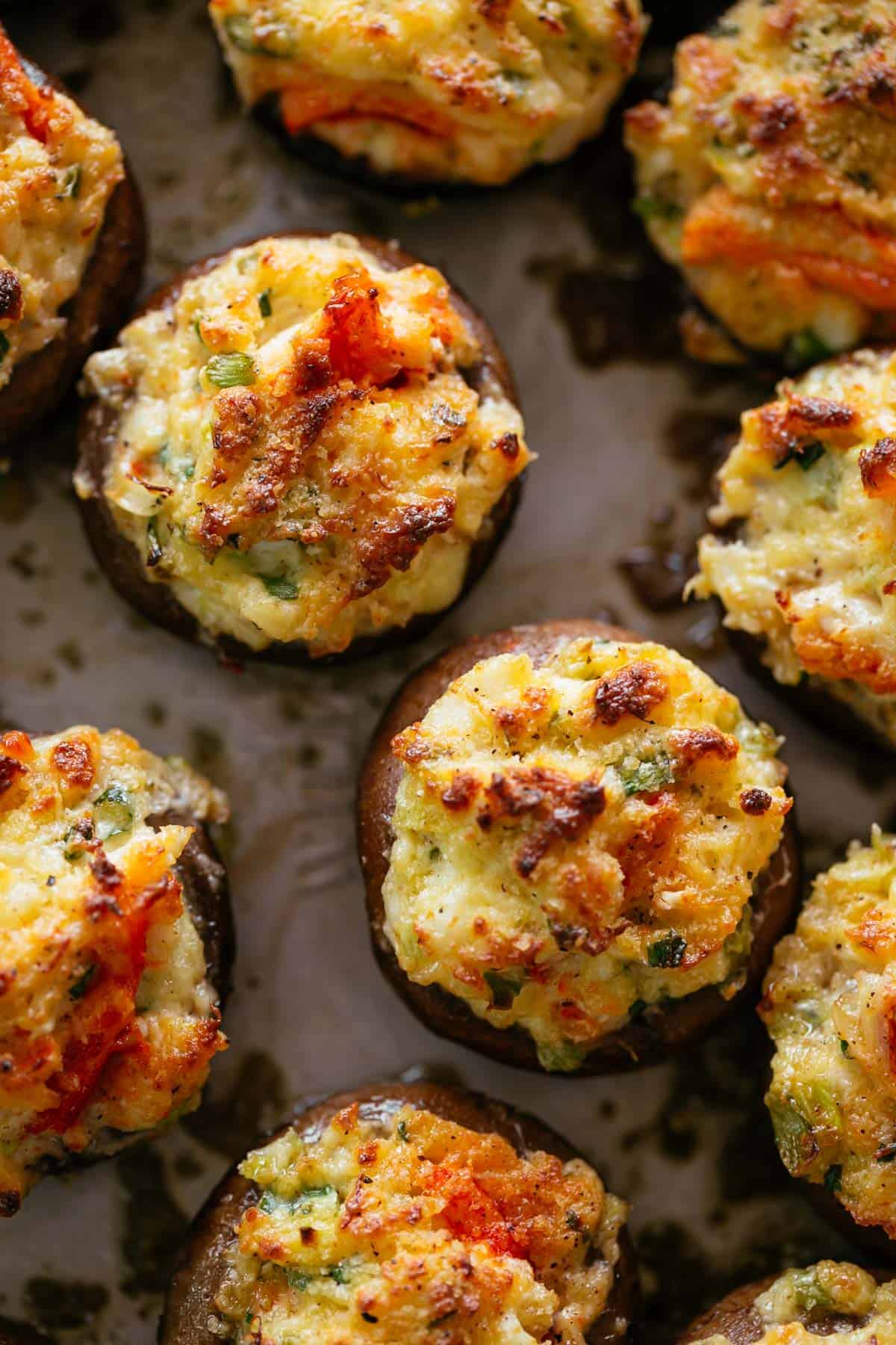 Stuffed mushrooms on a baking tray. 