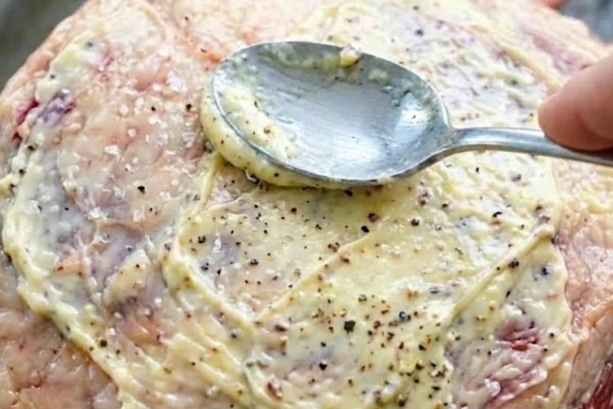  Rub the remaining garlic butter over the top and sides of the meat. Season all over with the remaining - 7