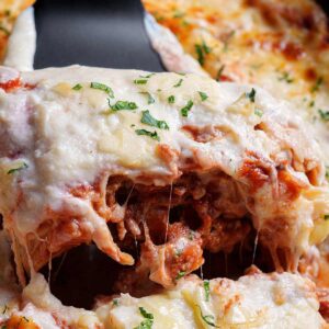 Shot of piece of lasagna about to be served