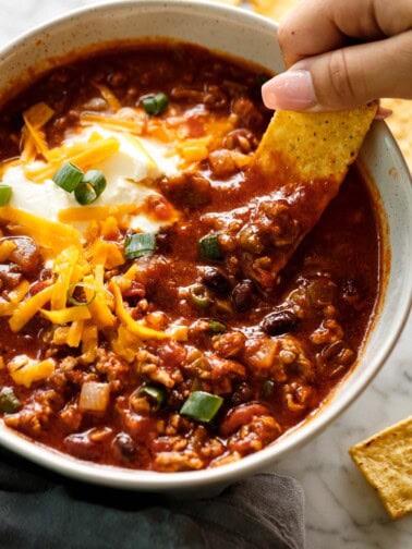 Nacho dipped under Slow Cooker Chili