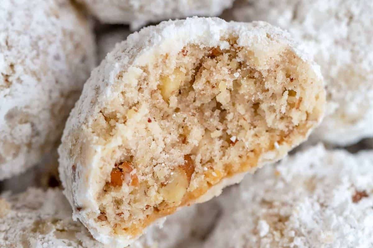 Let the cookies cool and roll them in powdered sugar.