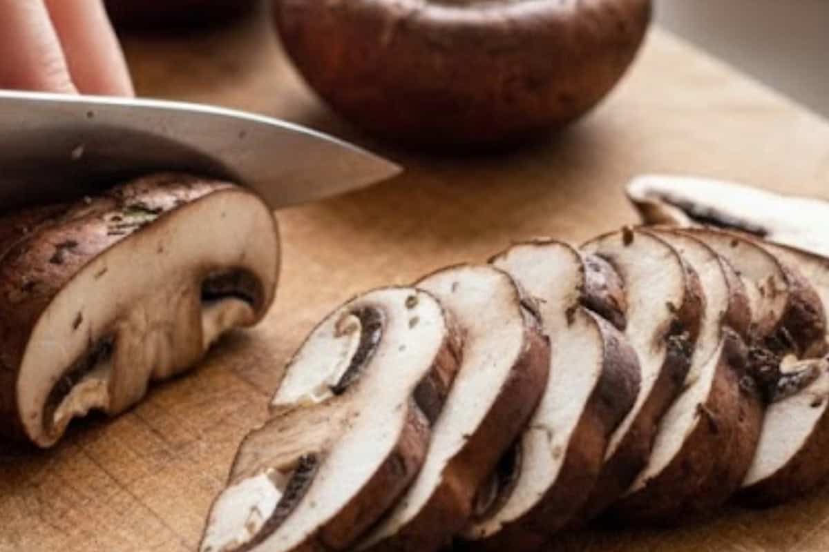 Remove the stems from the portobello mushrooms and slice each into 1/2-inch (1-cm) pieces for even cooking.