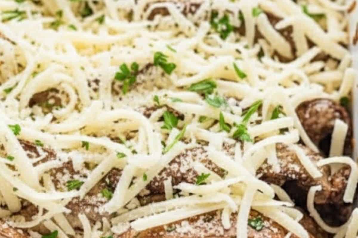 Add the remaining mushrooms and cheese in two more layers,