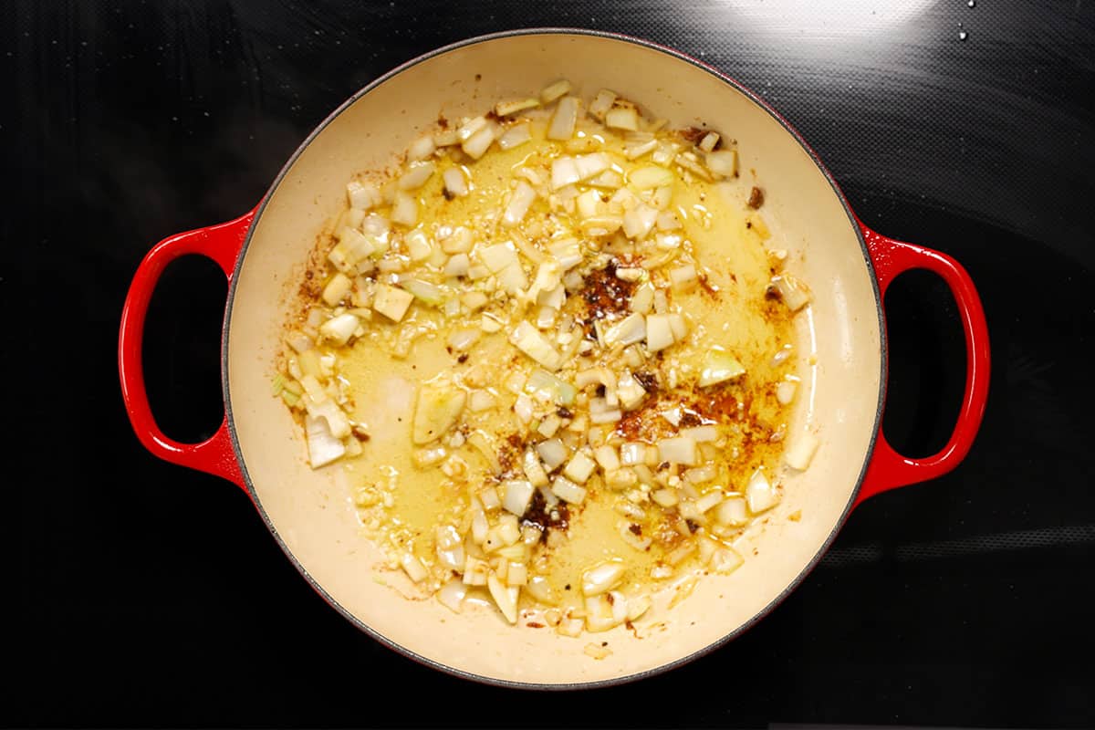 onion and garlic sautéing in a pan