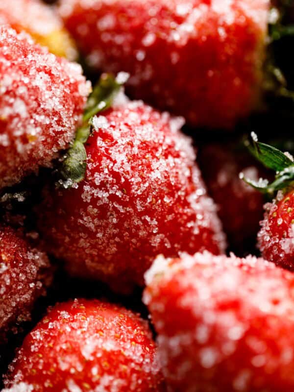 Strawberries soaked in champagne coated with granulated sugar
