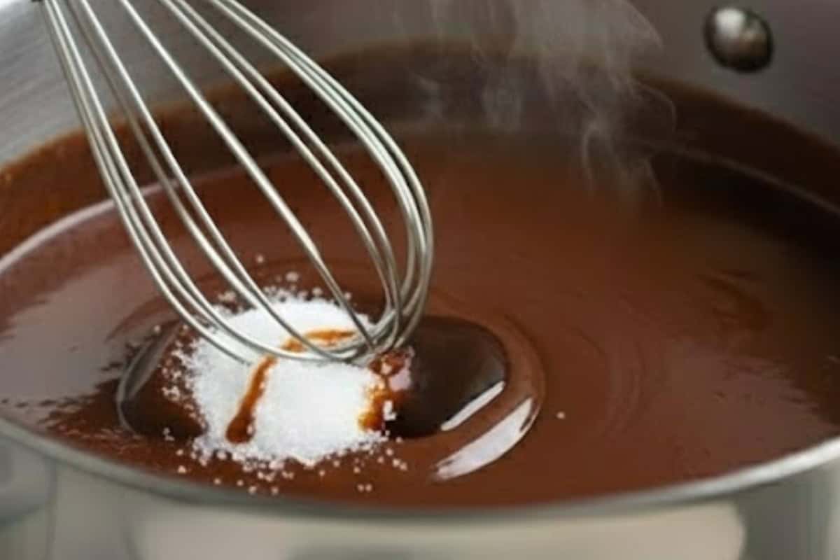 Remove from heat and stir in caster sugar and vanilla extract