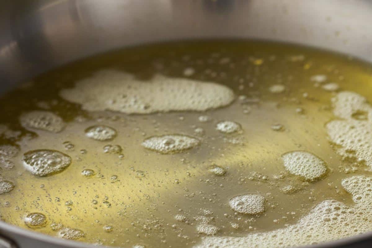 Melted butter with olive oil in a skillet.