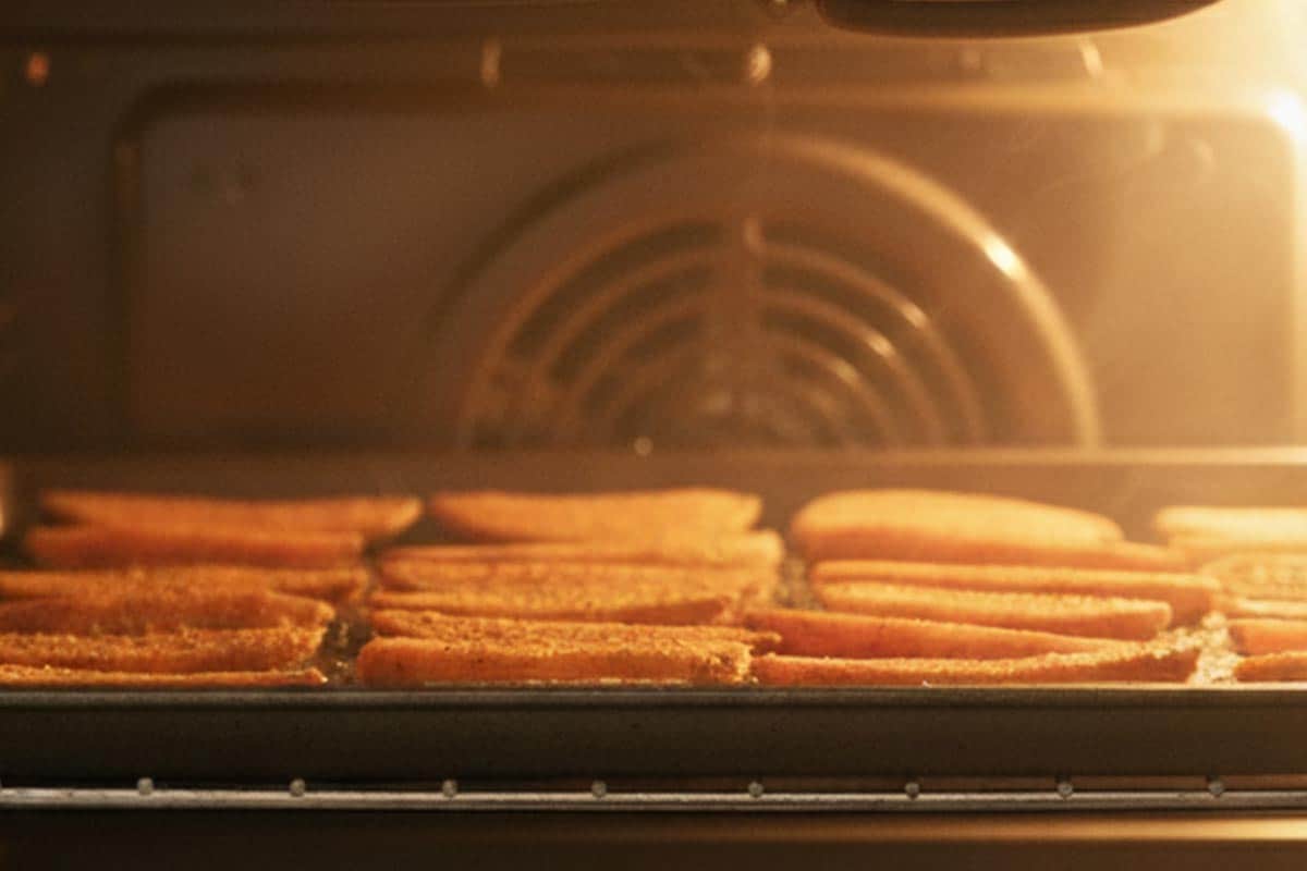 Baking the wedges in the oven.