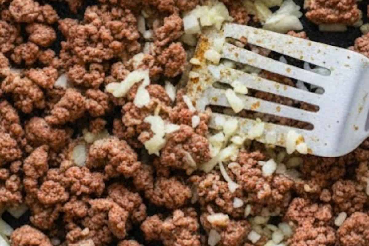 Add chopped onion and garlic and cook until they soften.