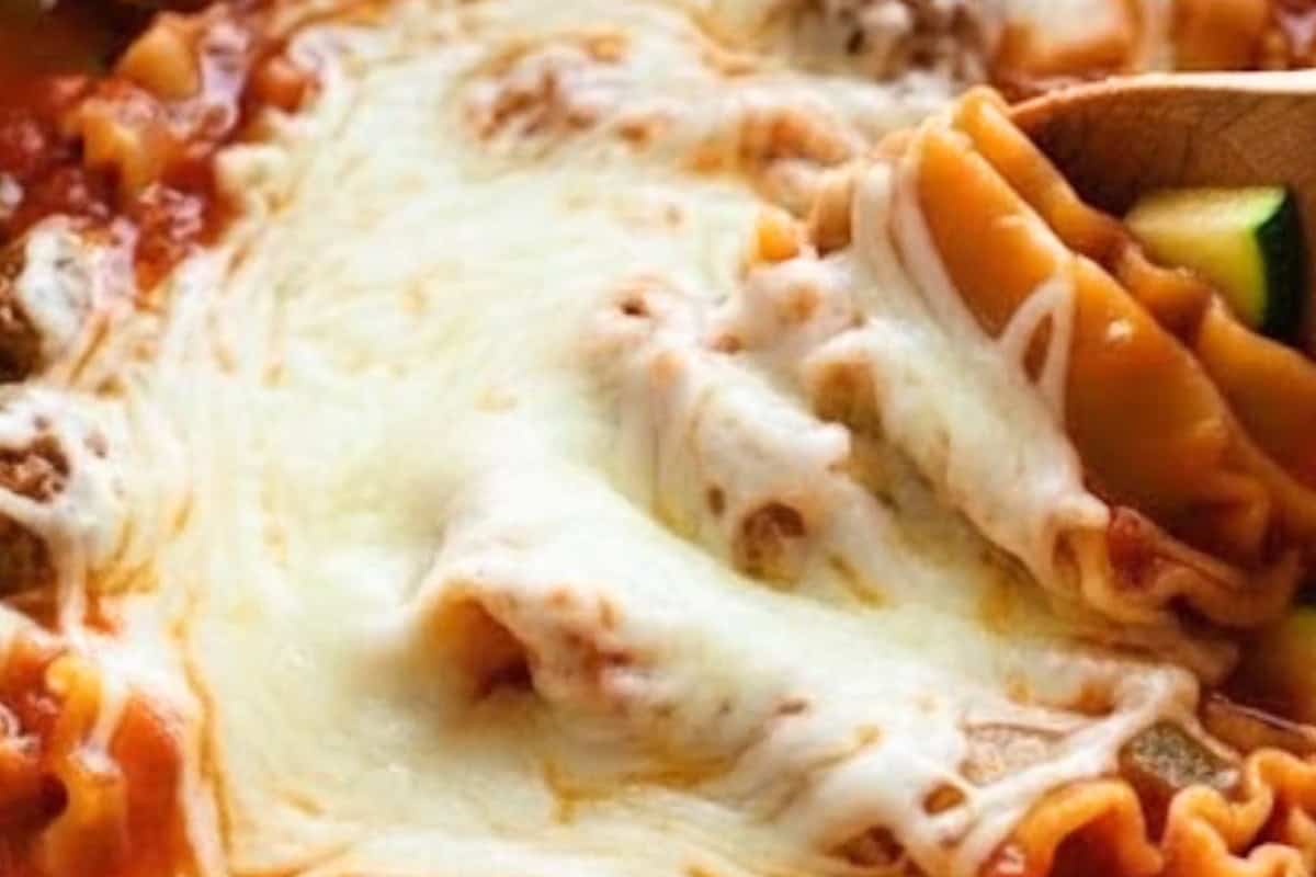 Add the noodles during the last 30 minutes of cooking. Cook until al dente and top with shredded mozzarella. 