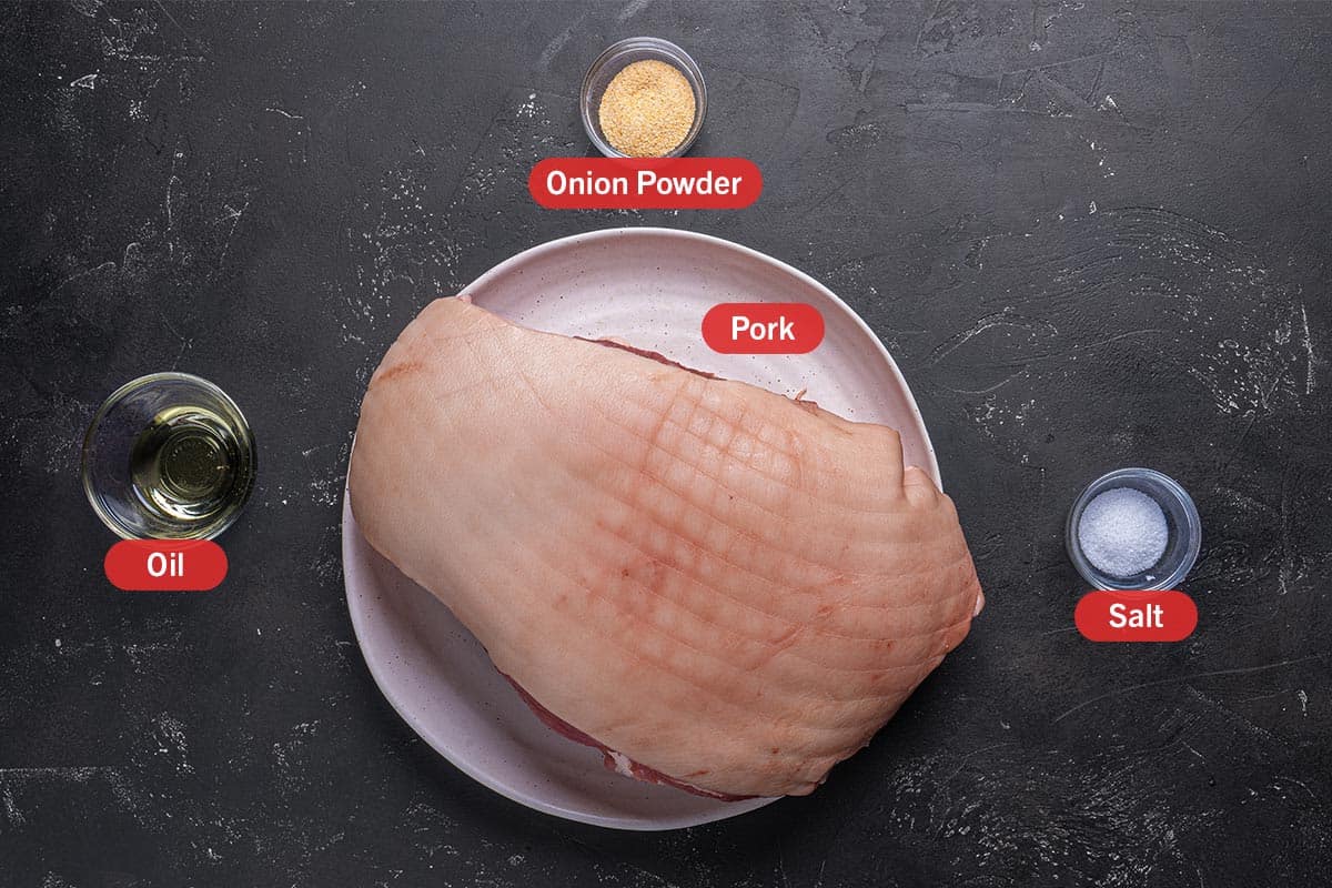 Image of the ingredients needed for the preparation of this recipe, specifically: Pork Shoulder, Oil, Onion Powder, and Salt.