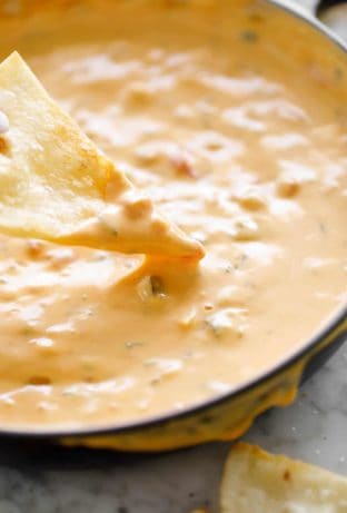 tortilla chips with Queso dip.