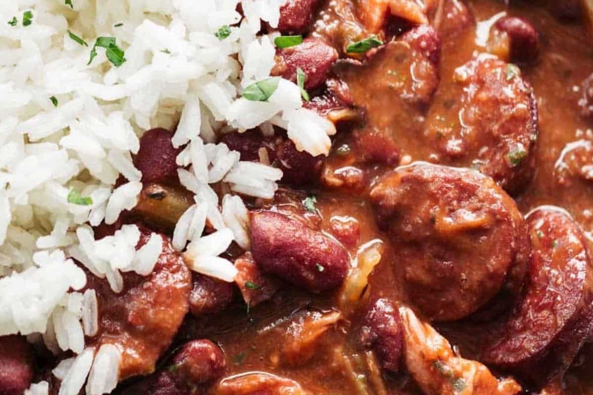 Spoon the red beans over warm rice and top with green onions.