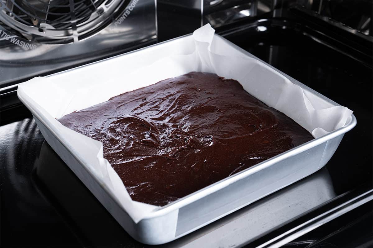 Image of the batter being placed in the oven to bake for 20-25 minutes.