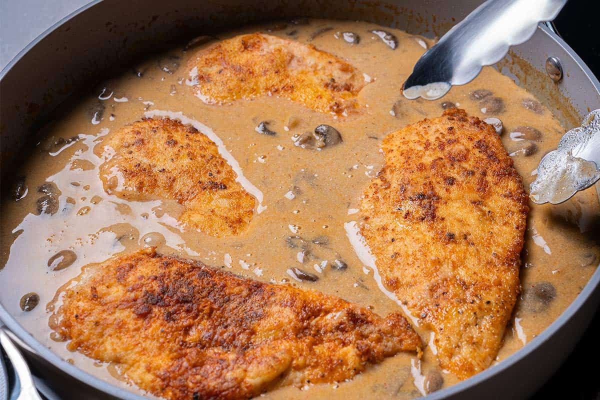chicken breasts place in the mushroom sauce