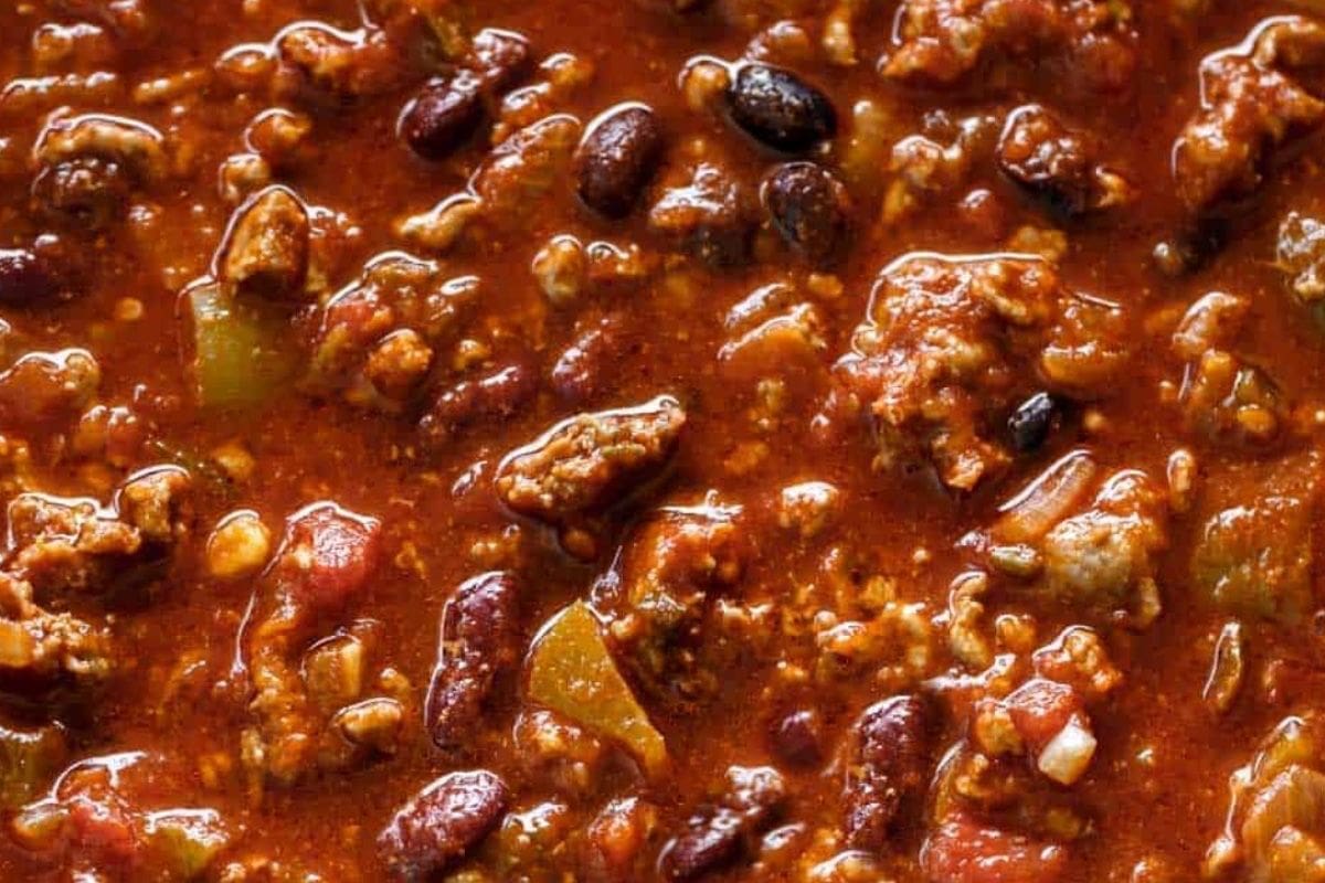 Add the kidney and black beans to the slow cooker.