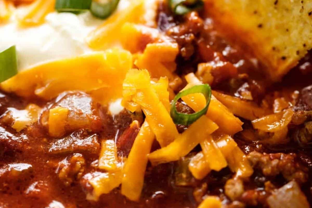 Scoop the chili into bowls and serve hot with your favorite toppings and sides.