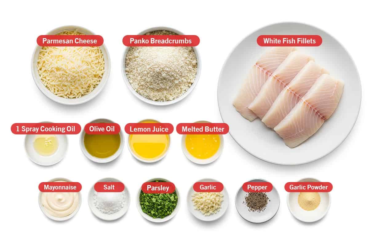 Top shot of ingredients: Parmesan cheese, panko breadcrumbs, white fish fillets, 1 spray cooking oil, olive oil, lemon juice, melted butter, mayonnaise, salt, parsley, garlic, pepper, and garlic powder.