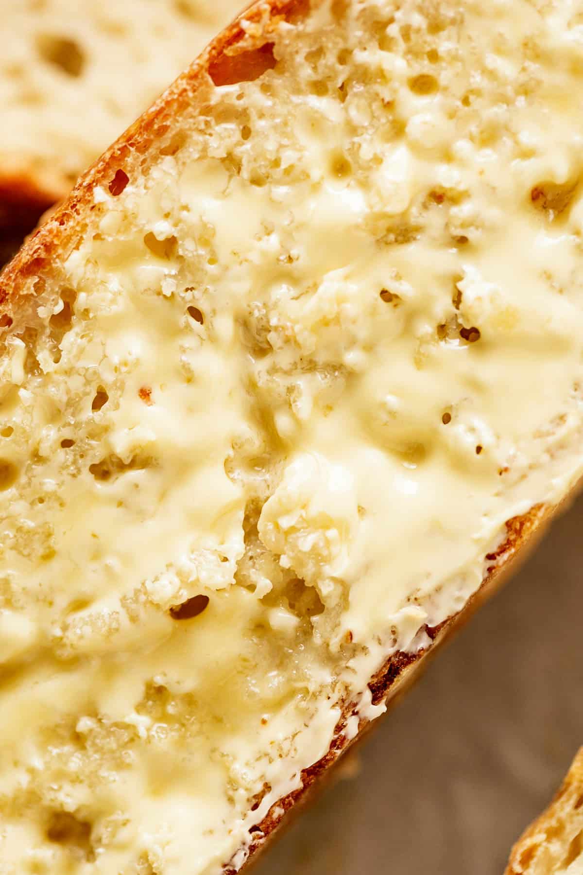Hot, buttered slice of Artisan bread