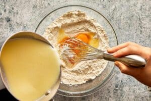 mixing wet ingredients in a bowl