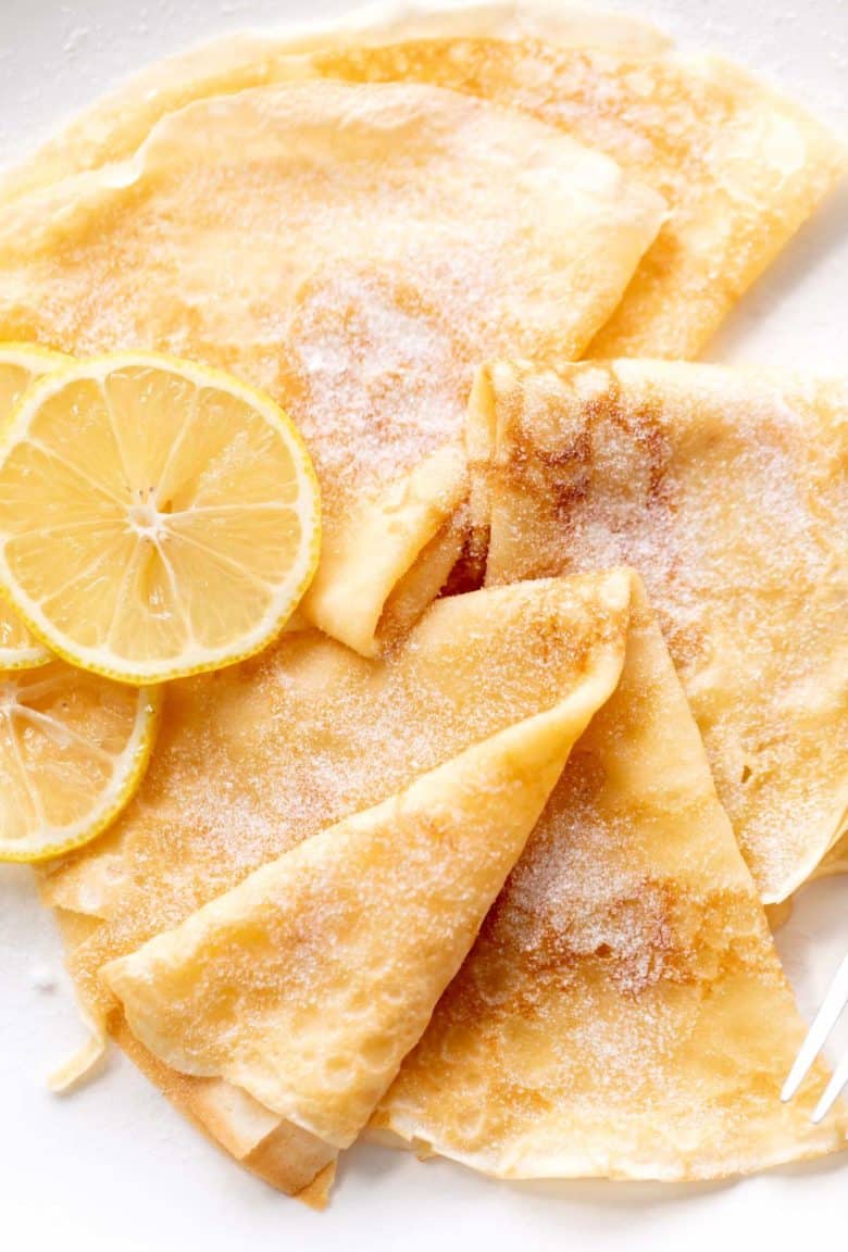 3 crepes with lemon slices and caster sugar | cafedelites.com
