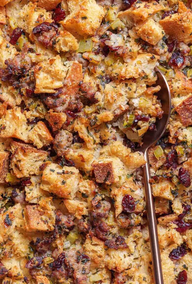 Image of Sausage Meat Stuffing being scooped up with a spoon.