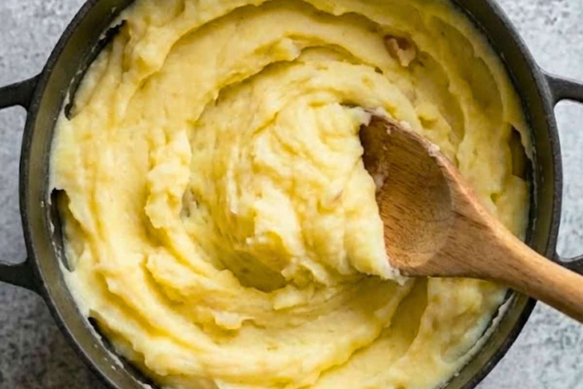 Mash the potatoes gently until creamy and mostly smooth