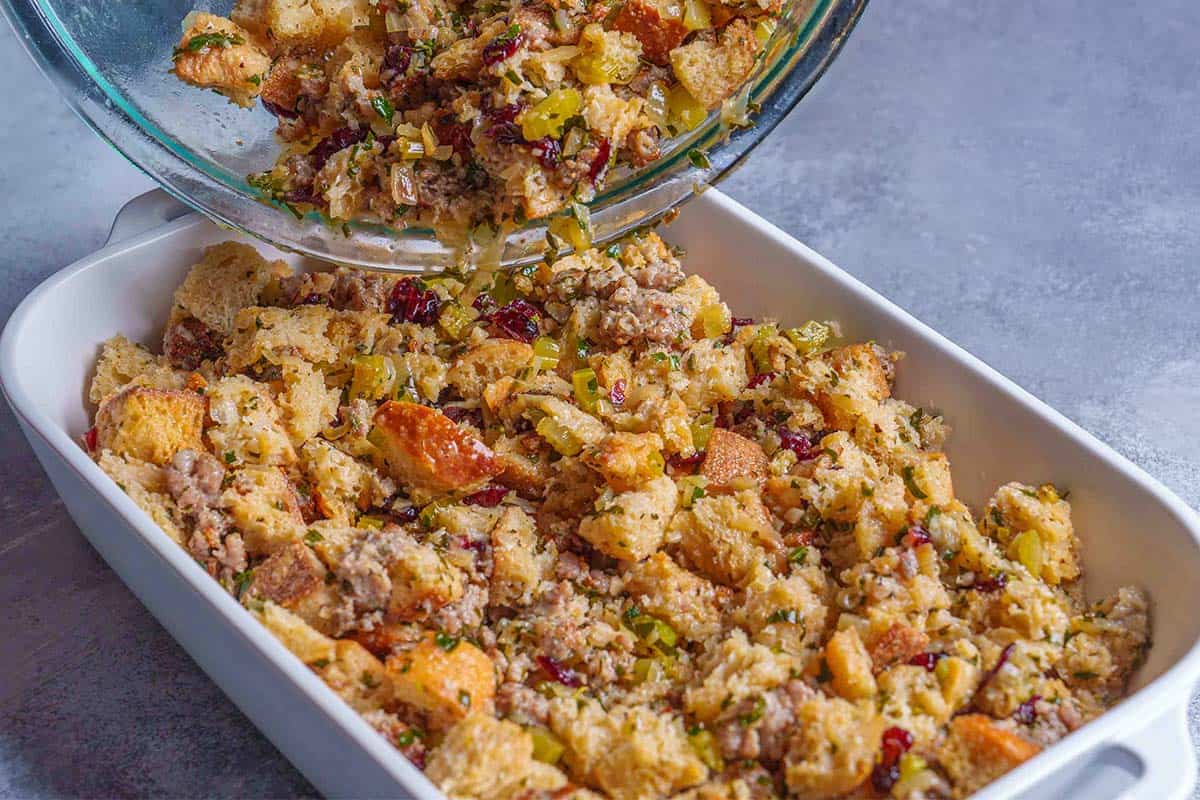 Step 6: The image shows the stuffing being transferred to a baking dish.