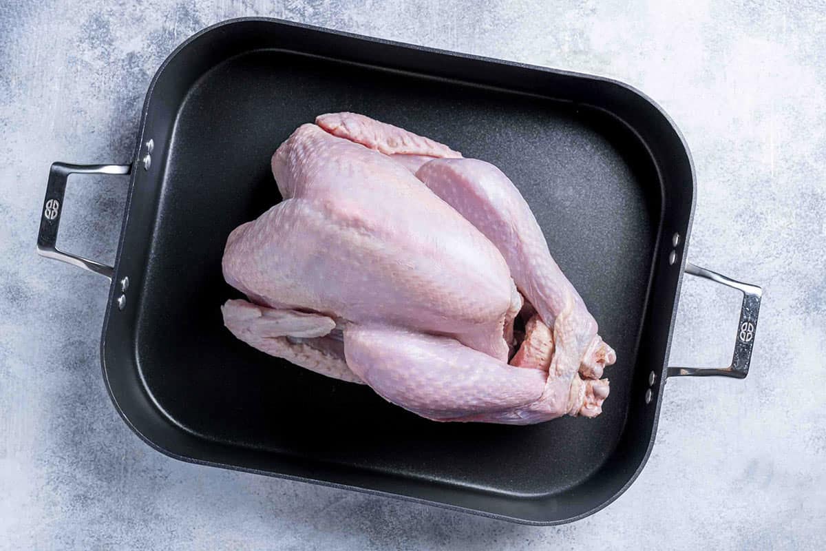 Defrosted Turkey in a cooking tray with giblets and neck removed