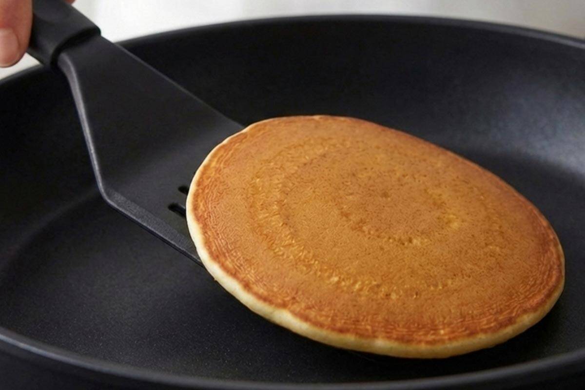 Flipping the pancake. - 8