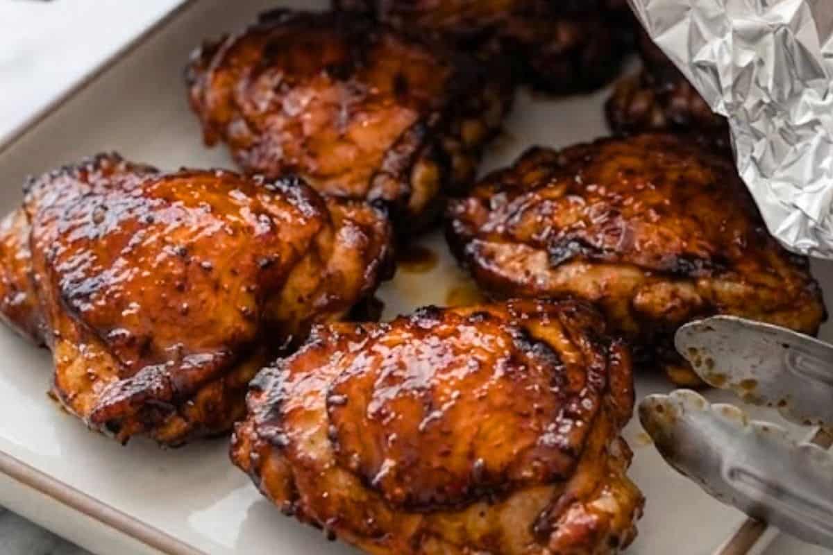 Transfer the cooked chicken to a serving platter and tent loosely with foil.