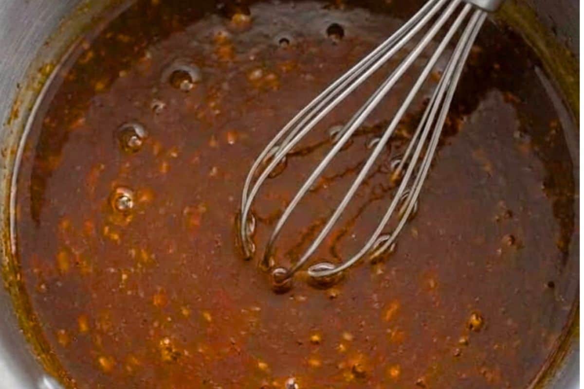 Pour the cooking juices into a pot set over medium high heat and bring to a simmer. Whisk water or broth with cornstarch