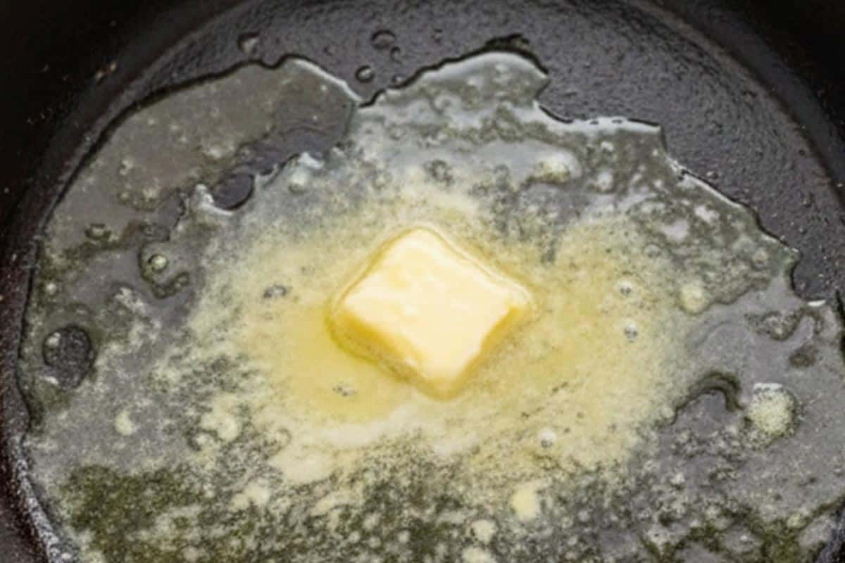 Heating the olive oil and butter in a pan