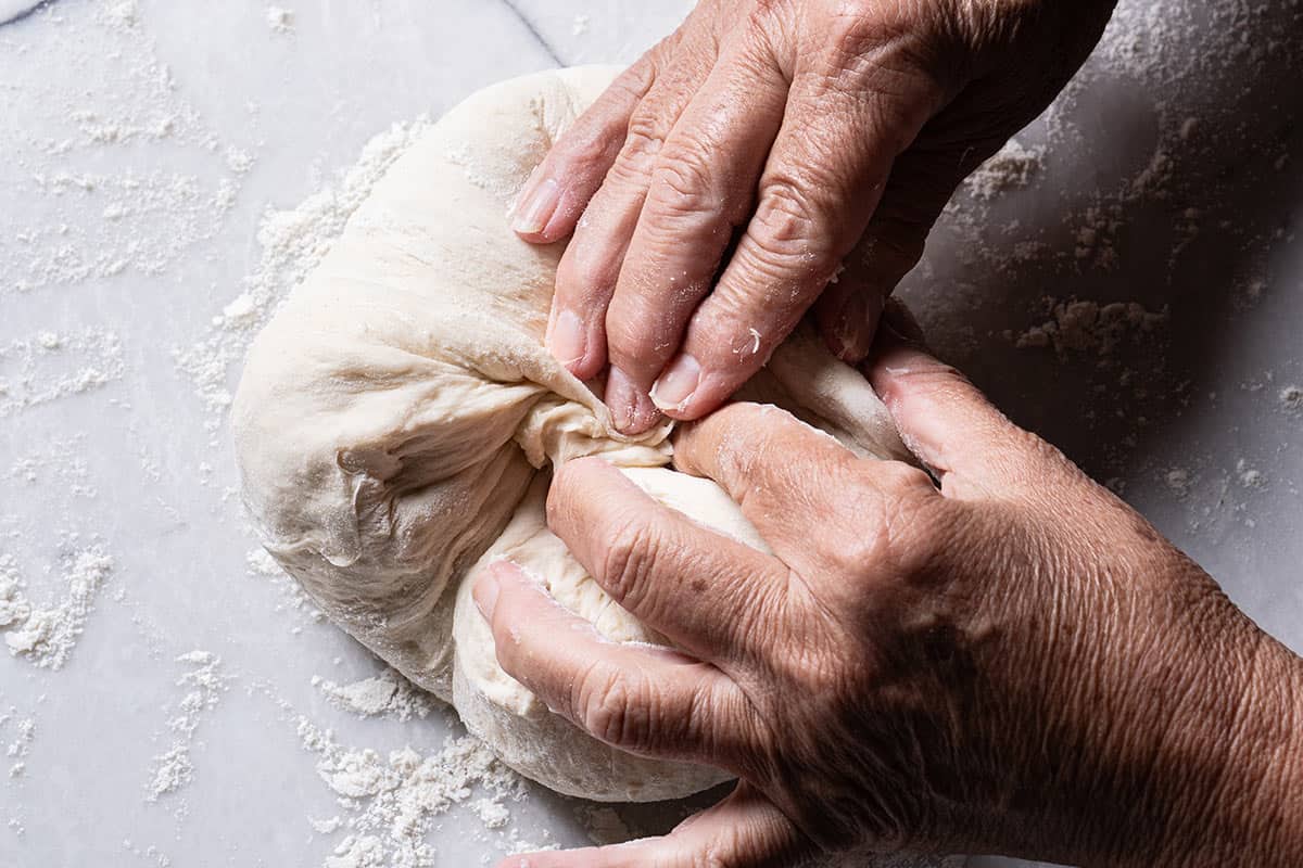 Image of hands folding the though.