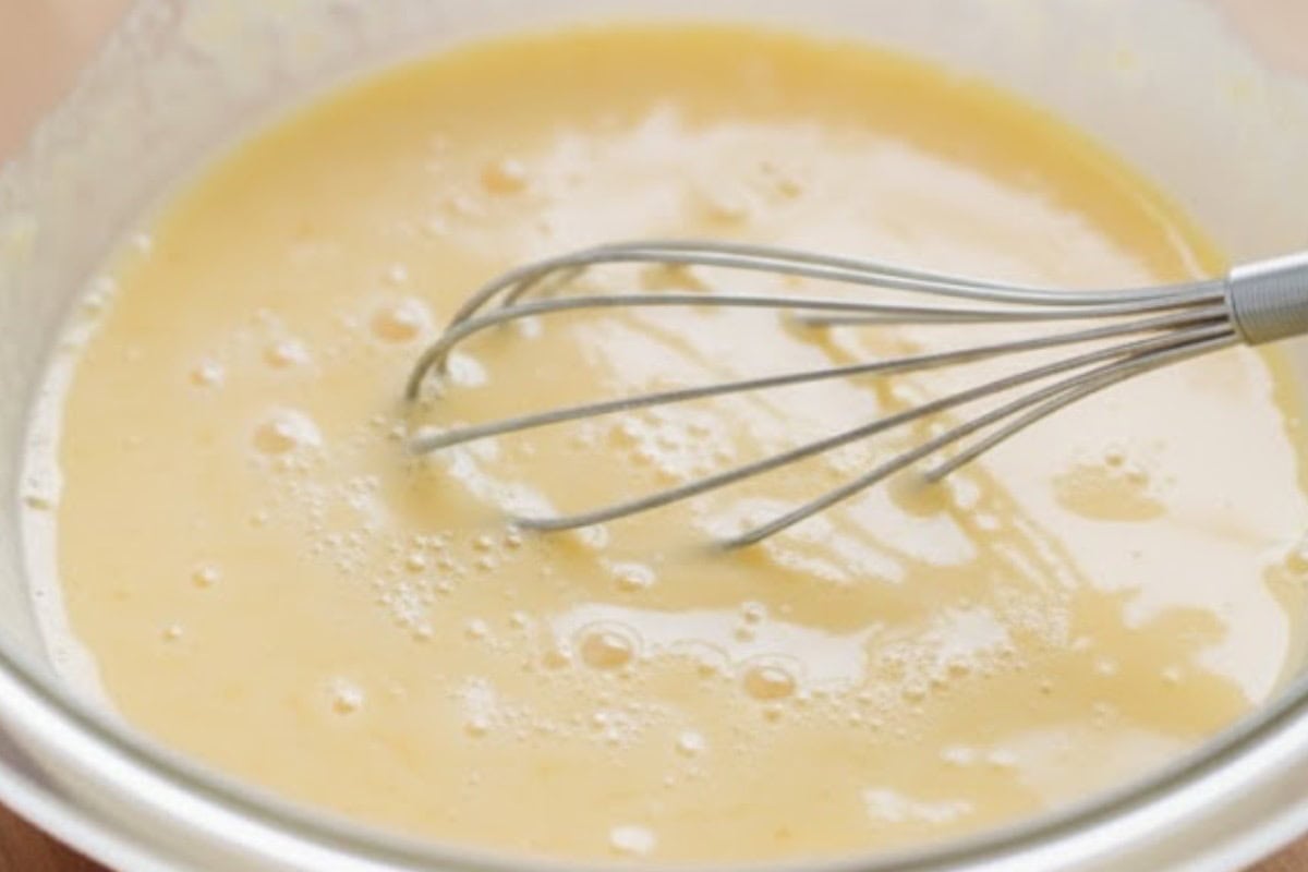 In a mixing bowl, whisk together the eggs, milk, and the remaining salt and pepper - 6