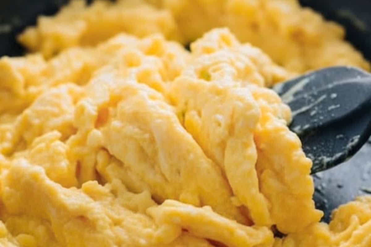 Pour the mixture into pan and let it sit for about 5 seconds before stirring. Use a spatula to fold the eggs gently until almost set. - 8