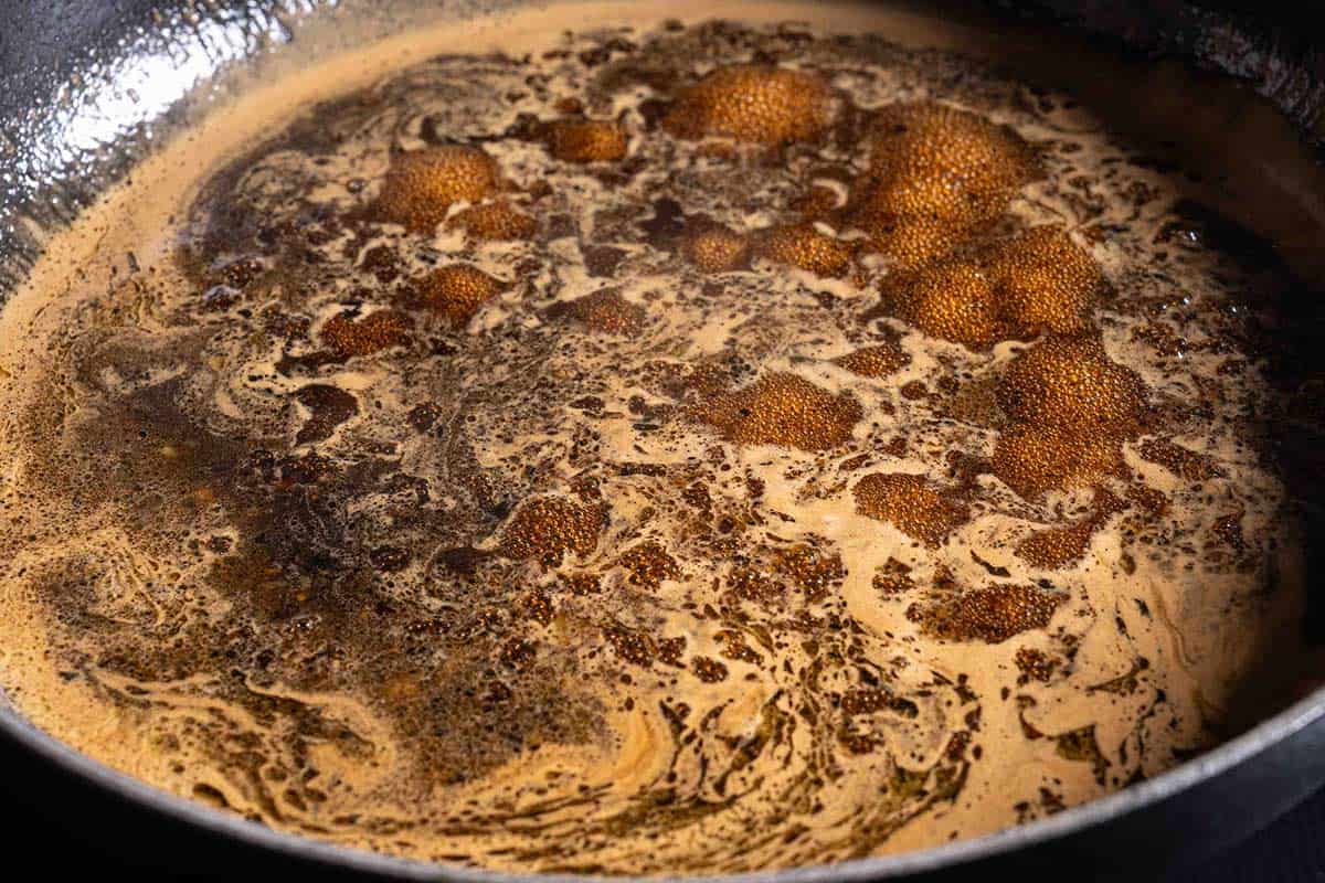 honey garlic sauce combined in bowl with a golden color