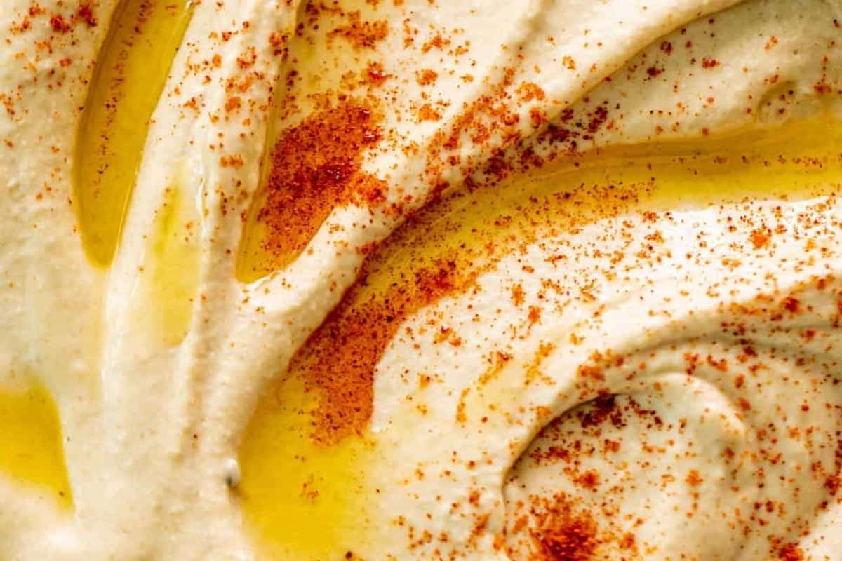 If your hummus is still too thick, add 1–2 more tablespoons of cold water until it reaches your desired consistency.
