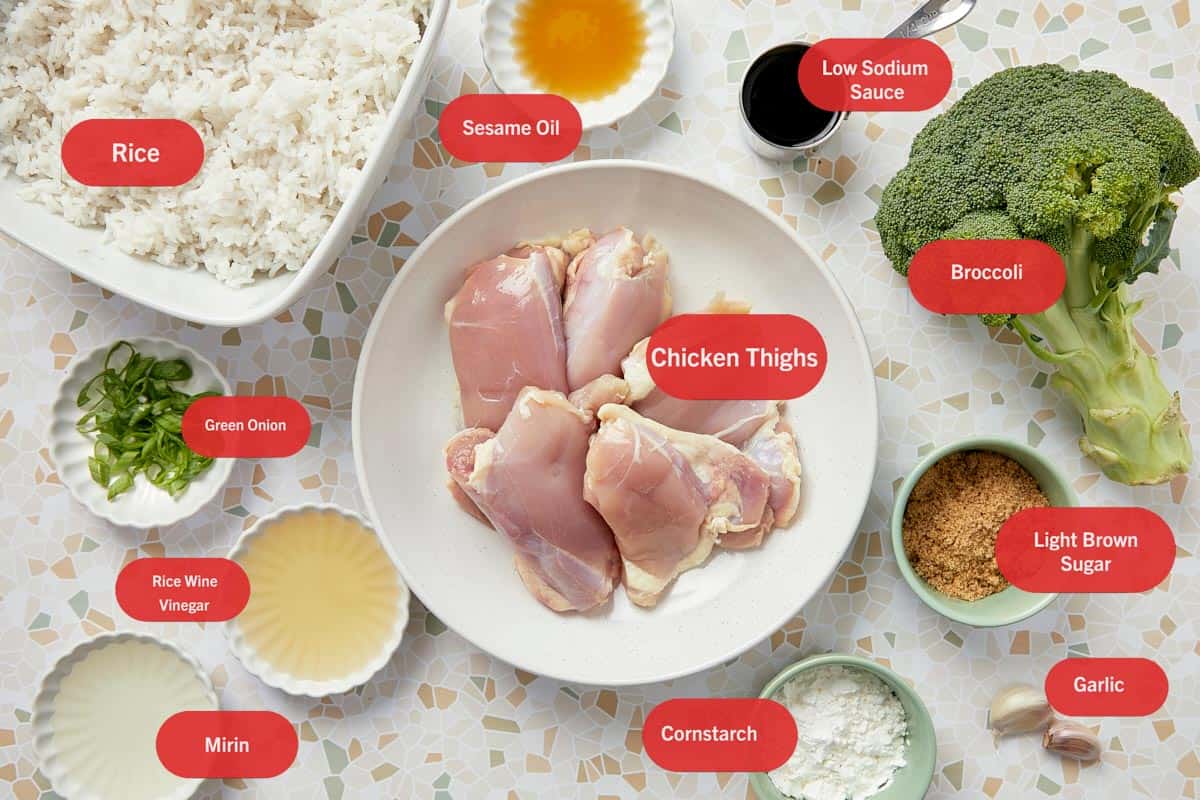 Labeled ingredients for air fryer teriyaki chicken arranged on a mosaic tile surface.
