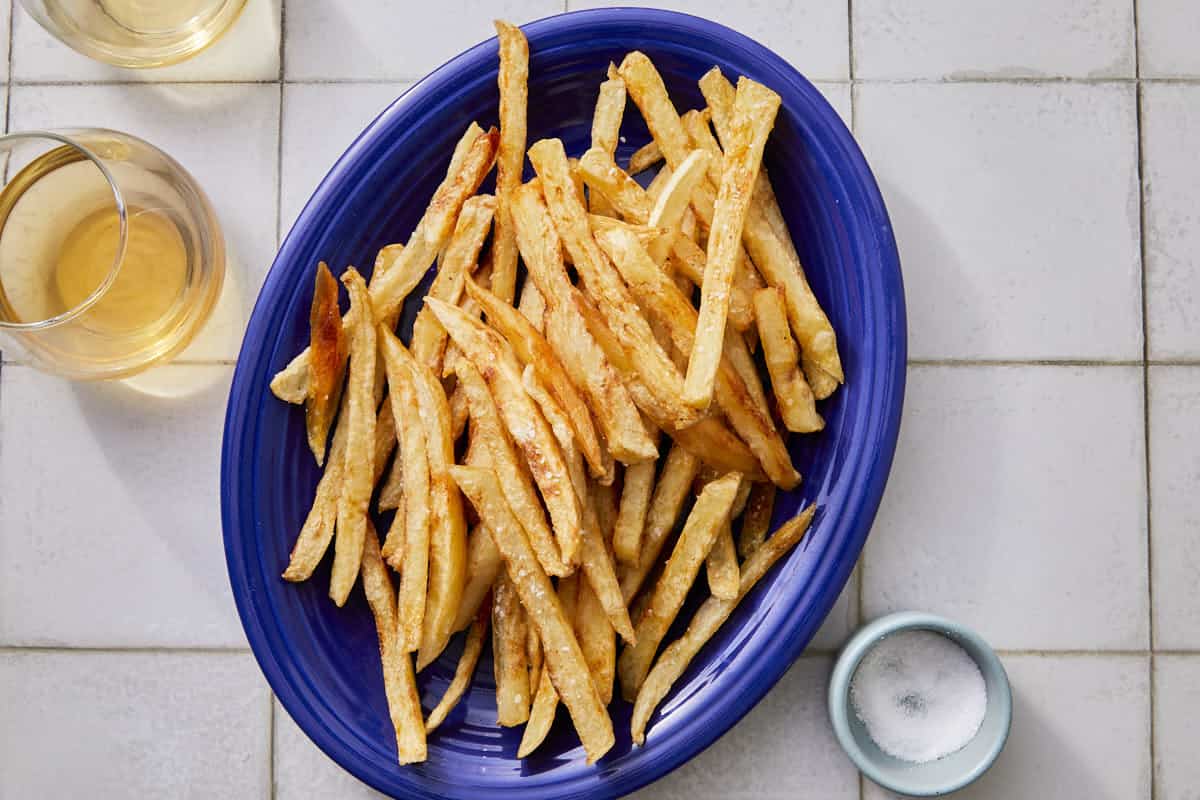 crispy fries in a blue bowl