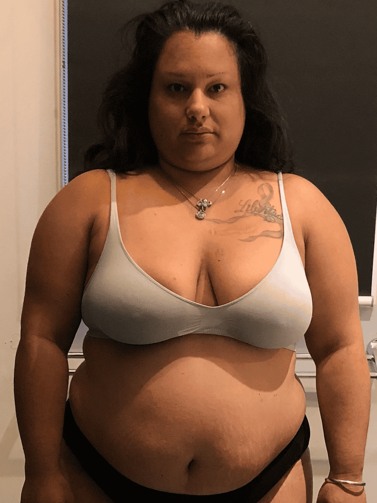 a before photo of karina where she was 55kg heavier
