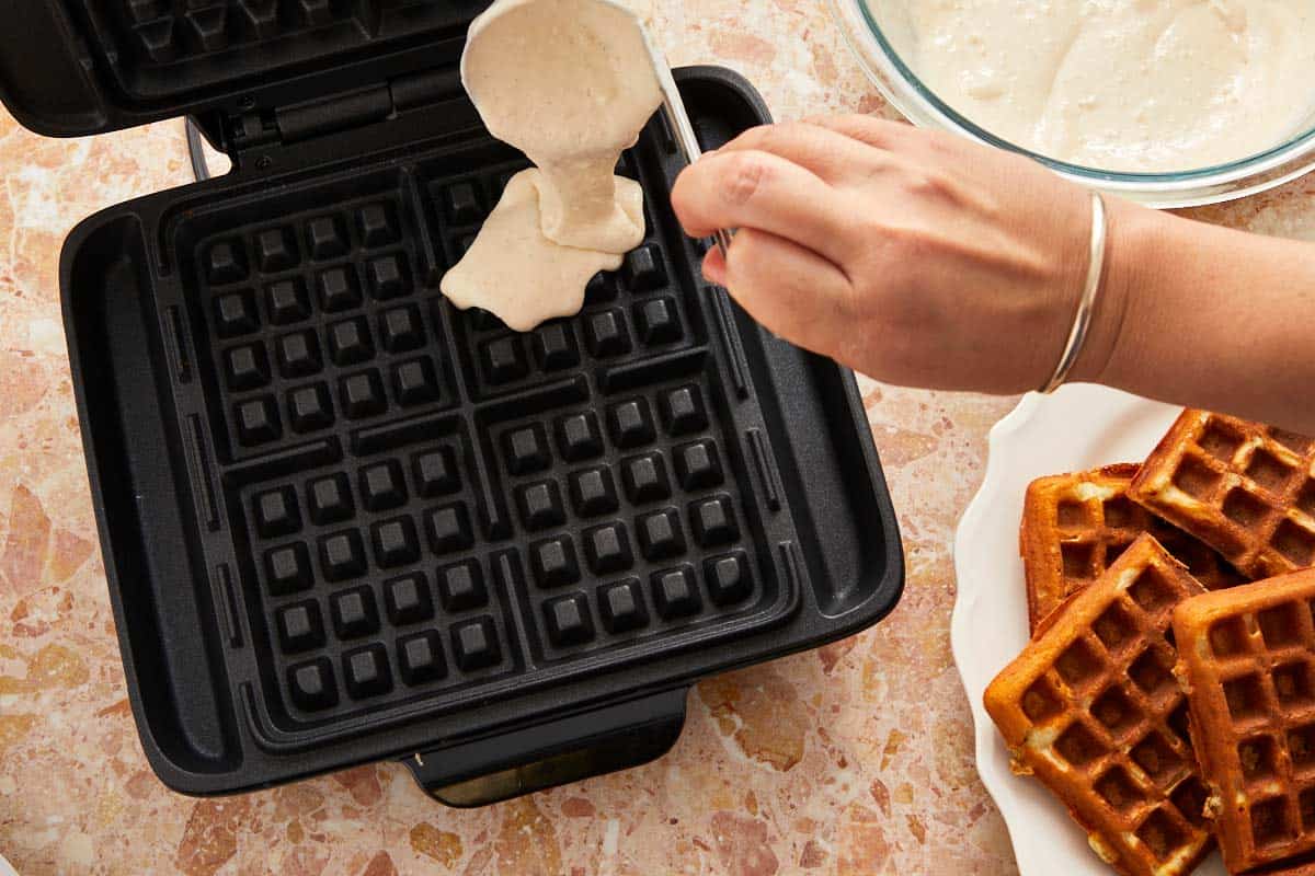 Pouring the batter in the waffle iron.