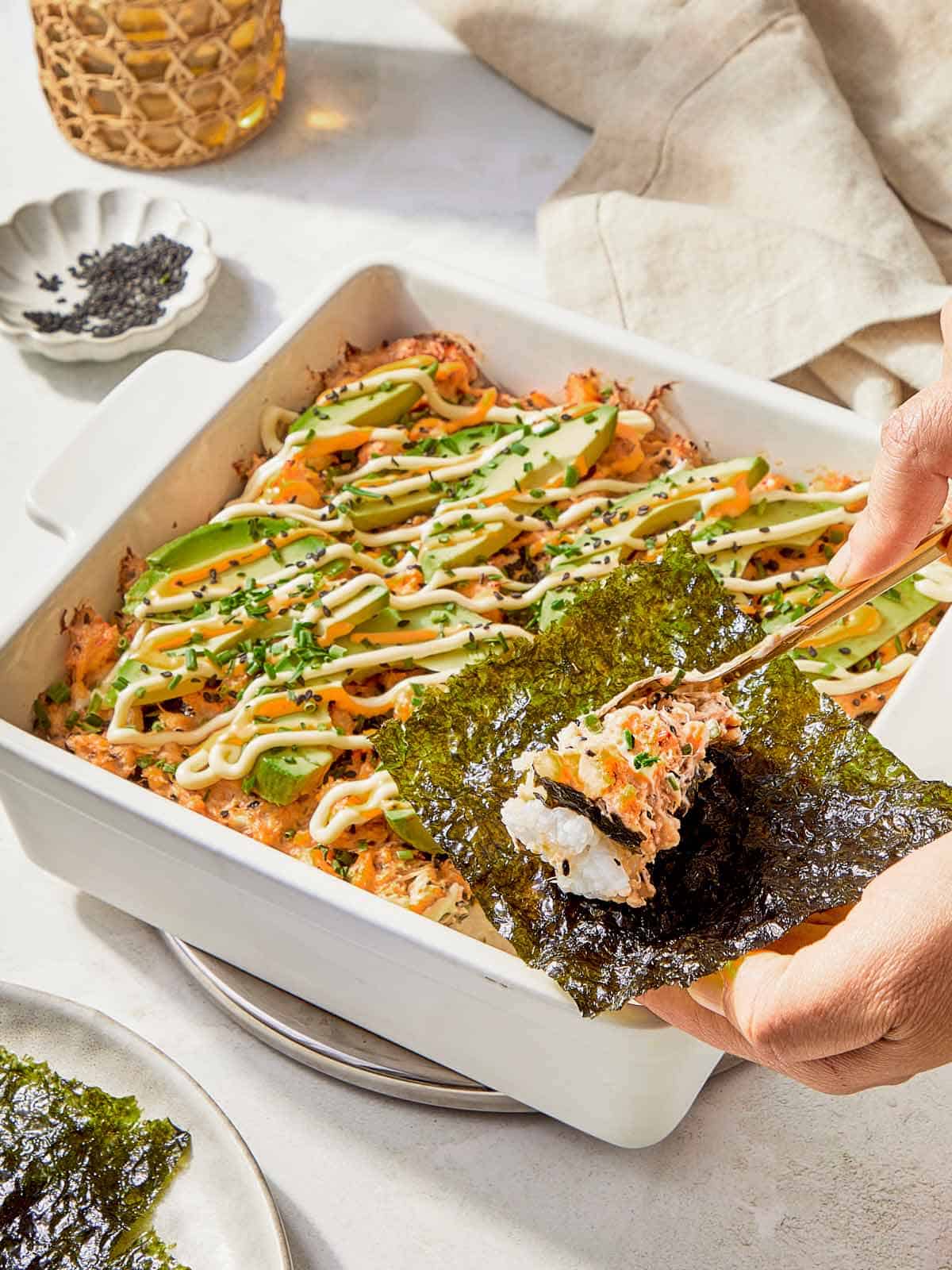 Sushi piece with seaweed, highlighting a delicious sushi bake dish.