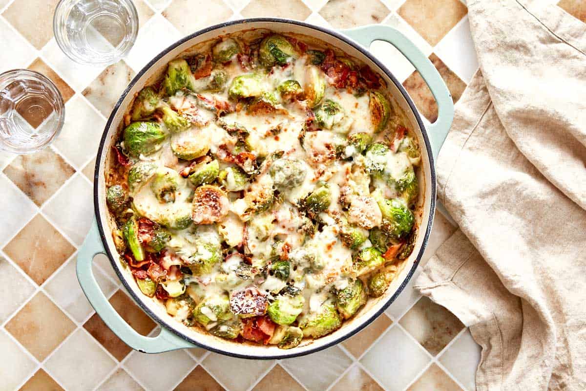 Creamy garlic parmesan Brussels sprouts baked with bacon